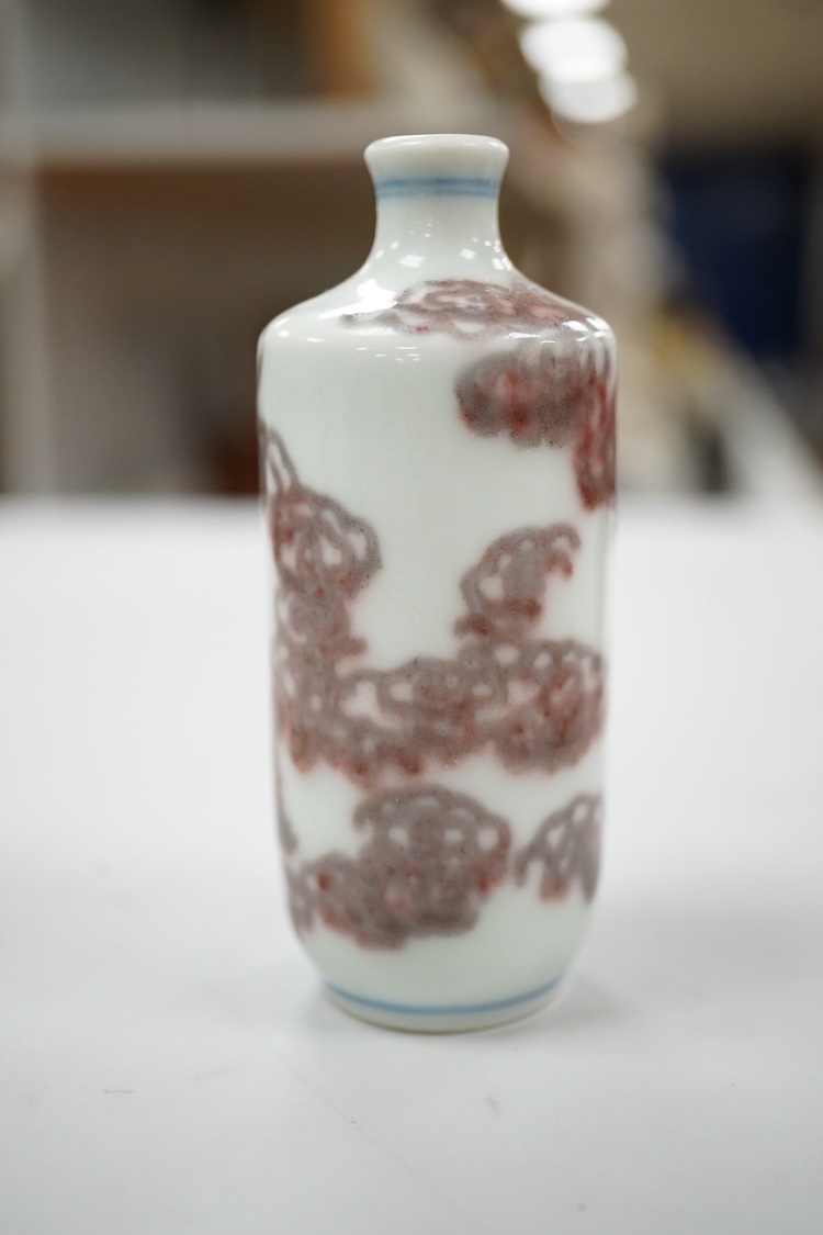 A Chinese cinnabar lacquer snuff bottle, a glass overlay snuff bottle and an underglaze copper red snuff bottle-9cm high (3)